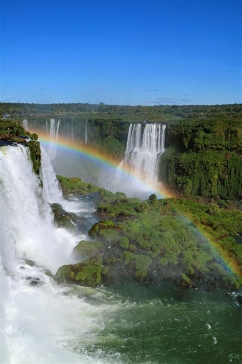 Vertical Image Of A Fantastic Rainbow Over The Powerful Brazillian Side