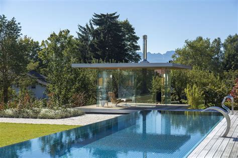 This Modern Pool House Is Surrounded By Glass Contemporist