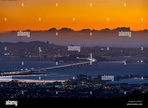 The San Francisco Skyline In California Usa During The Sunset Stock