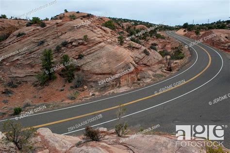 Paved Highway Through Rocky Desert Landscape Stock Photo Picture And