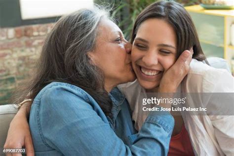 Adult Daughter Kissing Mom Photos And Premium High Res Pictures Getty