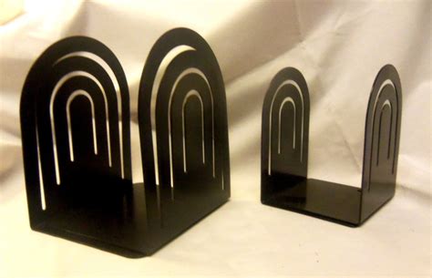 Two Sets Of Vintage Metal Bookends