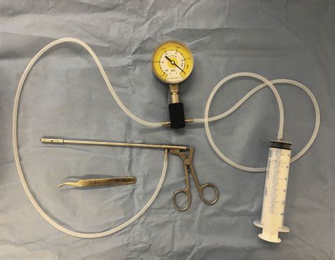 rectal suction biopsy device with manometer for defined suction