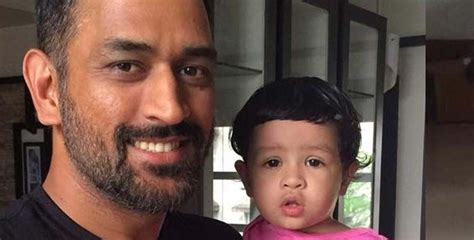 ms dhoni shares a video of him crawling with his daughter ziva