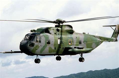 An Air To Air Left Side View Of A Ch 3 Jolly Green Giant Helicopter