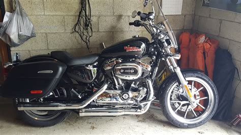 The downward slope does cause some issues for her comfort. Sportster solo seat suggestions - Harley Davidson Forums