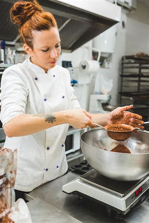 Pastry Chef Measuring Cocoa Powder On An Electronic Scale By Giorgio Magini For Stocksy United