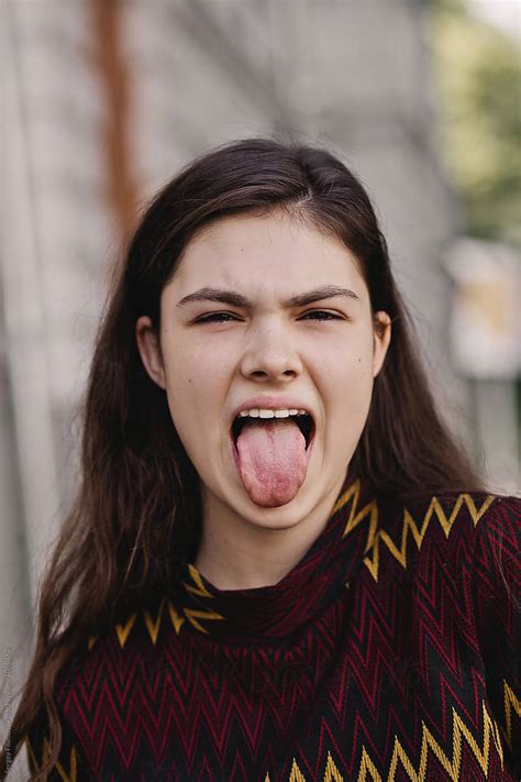 Pretty Girl Showing Tongue By Stocksy Contributor Serge Filimonov Stocksy