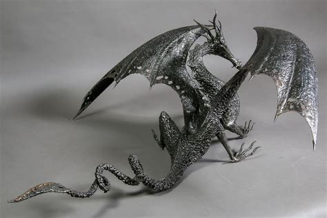 Black Metal Dragon Sculpture With Wings