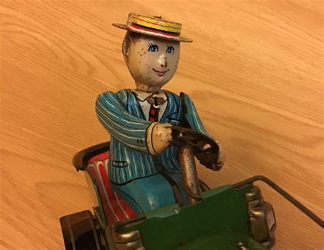 Japanese Vintage Tin Toy Car. Classic Automobil With Moving Driver