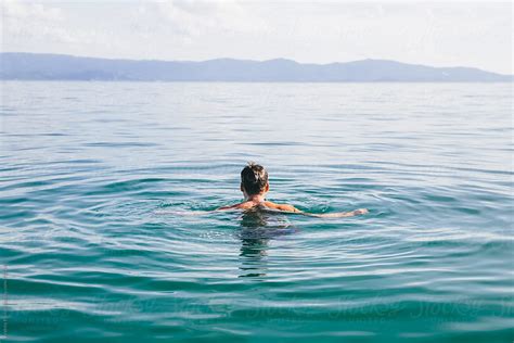 Man Swimming In The Sea By Stocksy Contributor Andrey Pavlov Stocksy