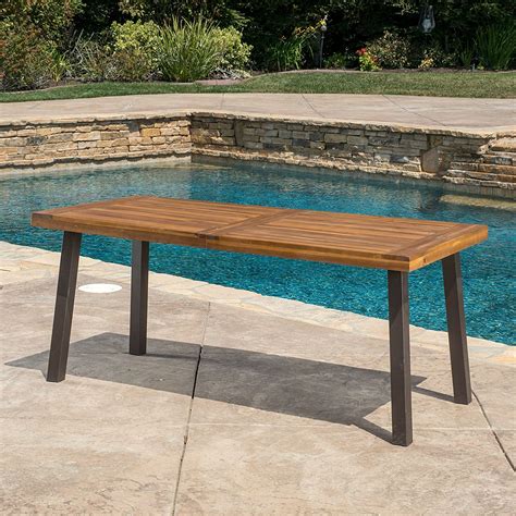 On flipkart, you will find an array of stylish dining tables made of teak wood and sheesham wood. Acacia Wood 69 x 32 inch Outdoor Patio Dining Table in Teak Finish