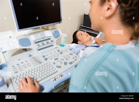 Nurse Using Ultrasound Treatment On Patients Neck Stock Photo Alamy