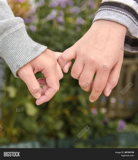 Hands Clasped Together Sign Image And Photo Bigstock