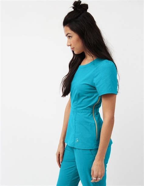 The Peplum Top In Teal Is A Contemporary Addition To Womens Medical