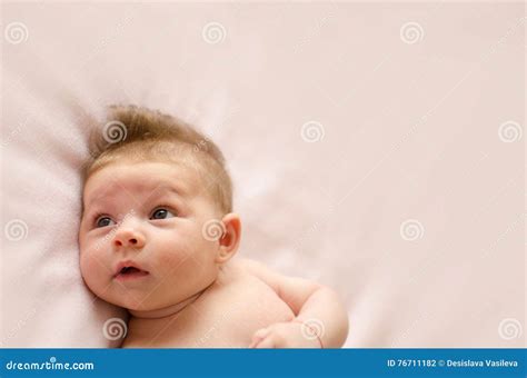Baby Girl Lying On Back Stock Photo Image Of Cute Face 76711182