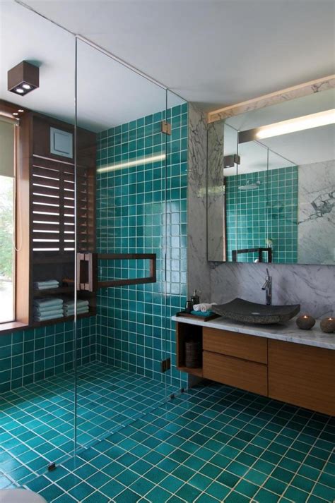 A glass tile with a translucent shine that bounces off the light adds a dynamic element but still keeps the bathroom a soft neutral. 22 stunning ideas of clean marble bathroom tiles