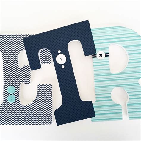 Navy Blue And Light Teal Letter Set With Button And Bow Embellishments