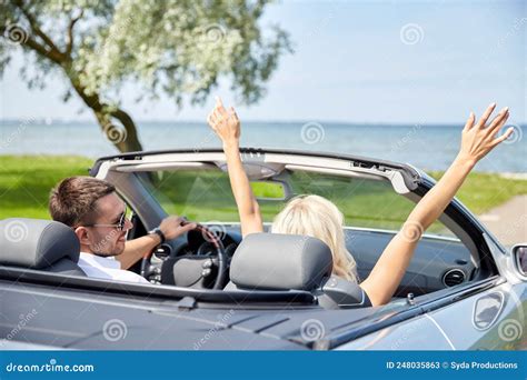 Happy Couple Driving In Convertible Car Stock Image Image Of Luxury