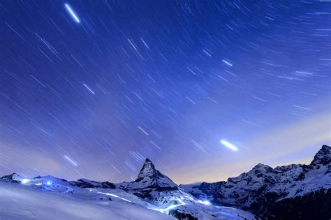 Stars In The Night Sky Over Matterhorn Mountain Switzerland Photo