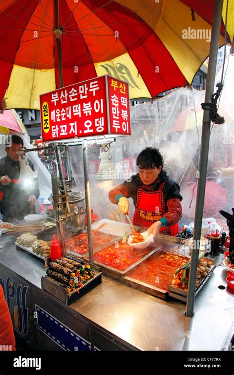 Street Vendors Selling Traditional Korean Food From Stalls In Busan