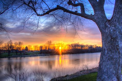 Sunset at Beckman Mill with pond in the landscape in ...