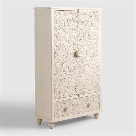 A beautiful large jewelry armoire , with a carved flower pattern in shabby chic. White Carved Wood Floral Armoire by World Market | Grey ...
