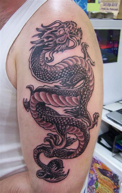 It looks cool like most other tribal tattoos and brings forth the message you wished to express. 25 Breathtaking Dragon Tattoos Designs for You - The Xerxes