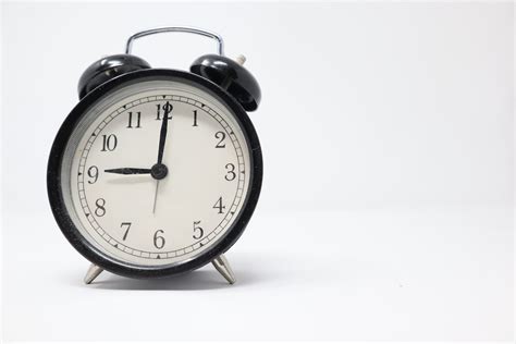 Black Alarm Clock Photo Free Clock Image On Unsplash