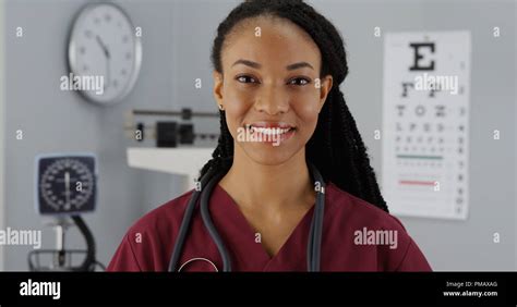 Black Woman Doctor Smiling At Camera Stock Photo Alamy