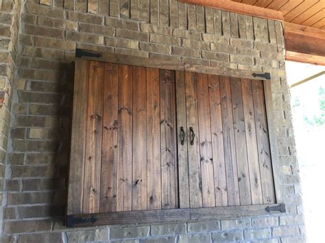 Consider installing a wood block on the tv mounting plate so the door stays open once the tv passes. Wall mounted outdoor TV cabinet made to look like art, to ...