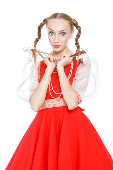 Pretty Young Cheerful Woman With Ridiculous Plaits In Russian Folk