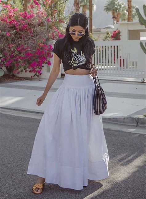 sydne style shows how to wear the maxi skirt trend with summer outfit ideas by fashion blogger