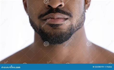 Close Up Of Groomed Beard Of Mixed Race African Guy With Nose Piercing