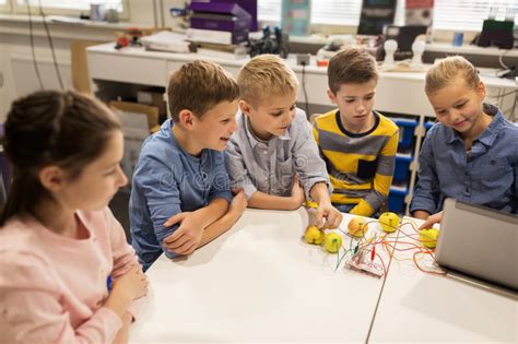 Kids With Invention Kit At Robotics School Stock Photo