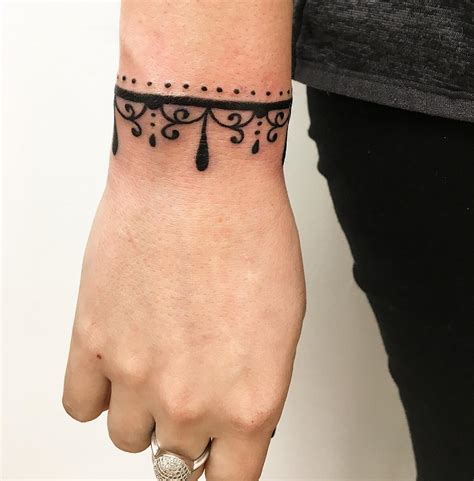 The idea of wristband pieces revolves around the idea of permanently inking wrist with a bracelet or chain type tattoo. 90+ Best Small Wrist Tattoos - Designs & Meanings (2019)