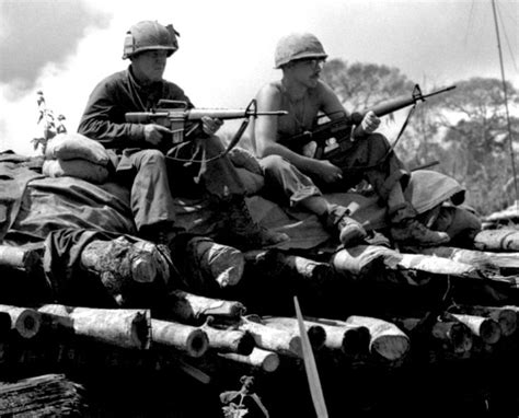 Soldiers Of The Us Army 4th Infantry Division Sit On Top Of A Bunker At