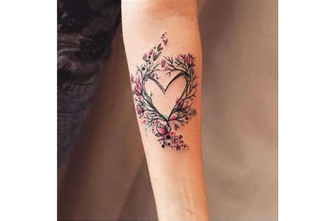 This woman symbol will tell that you are a fan of strong individuals who have made it through in life. 120 Best Heart Tattoo Designs with Meanings - Small Heart ...