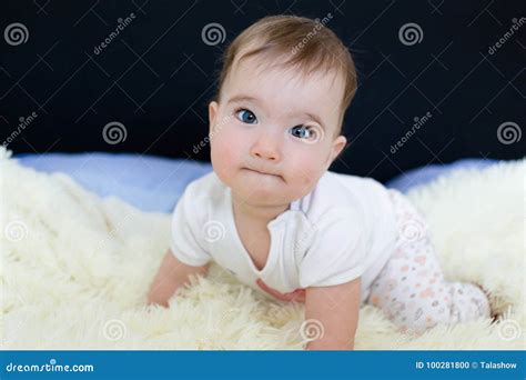 Beautiful Blue Eyed Little Baby On The Bed Stock Photo Image Of