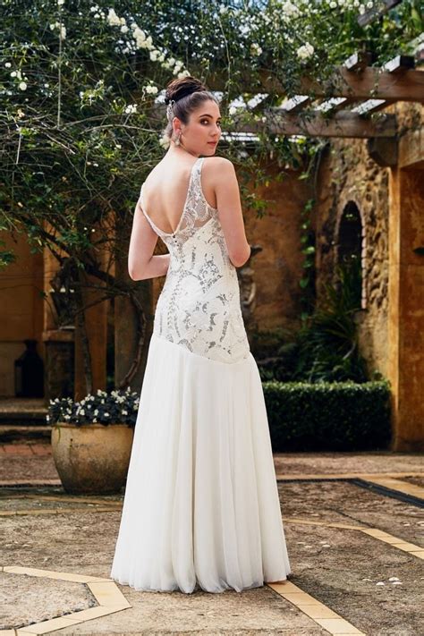 I had two terrible experiences with other designers when trying to find a wedding dress, i. Paddington Weddings - the 'Justine' gown. Almost has a 20 ...