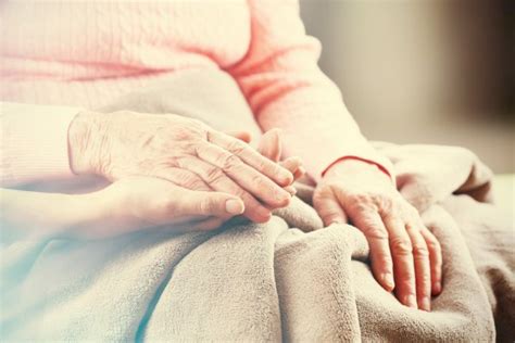 Nurse Holding Patient Hands — Stock Photo © Lighthunter 34761513