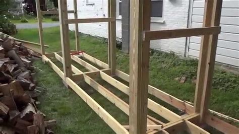 The challenge is protecting your woodpile from rain and snow. How to build a simple firewood shed by yourself (part 1) - YouTube