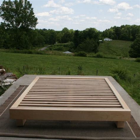 The modrest opal modern low profile black oak and grey leatherette platform bed presents an oriental touch with an extended frame made from mdf with. NbRsN02a Solid Hardwood Platform Bed with large block feet ...