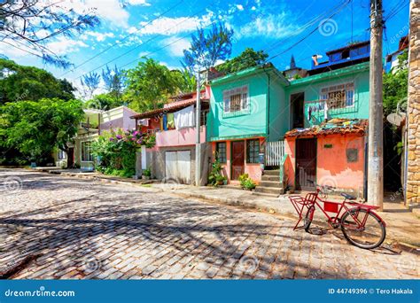 Colorful Small Houses Along A Cobbled Street In Buzios Brazil Stock