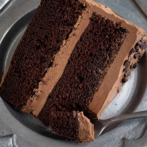 This cake is simple, perfectly moist and the homemade chocolate frosting is simply divine! Chocolate Cake Recipe | Baked by an Introvert®