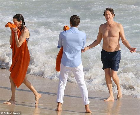 Paul Mccartney Frolics In The Sea With Wife Nancy Shevell Daily Mail Online