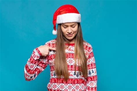 Premium Photo Young Pretty Woman Wearing Christmas Clothes
