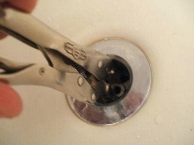 Clean and dry the area around the drain completely. 6 Easy Steps to Remove a Bathtub Drain