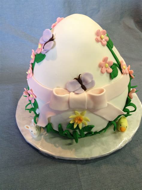 Easter Custom Cake A White Easter Egg Covered In Blooms And
