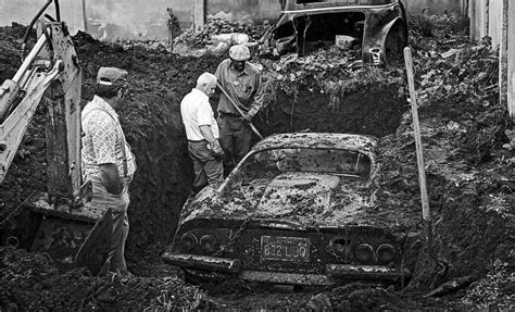20 Photos Of Cars That Were Buried Underground